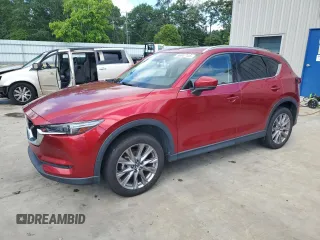 2019 Mazda CX-5 Grand Touring with VIN JM3KFADM2K1657915, listed as a Copart auction lot 56647145 with 85,095 mi miles and Salvage title. Bid and sale history available at DreamBid. Image 1.