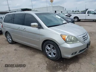 2009 Honda Odyssey Touring с VIN 5FNRL38979B052923, выставлен на аукционе IAAI как лот 42427207 с пробегом 201 483 миль миль и . История ставок и продаж доступна на DreamBid. Изображение 1.