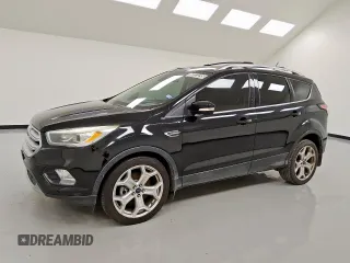 2018 Ford Escape Titanium with VIN 1FMCU9J92JUA30979, listed as a Copart auction lot 58323295 with 200,901 mi miles and Clean title. Bid and sale history available at DreamBid. Image 1.