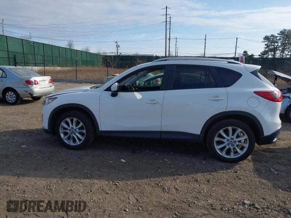 2014 Mazda CX-5 Grand Touring with VIN JM3KE4DY7E0425201, listed as a IAAI auction lot 41803597 with 118,867 mi miles. Bid and sale history available at carsss.com. Image 15.