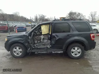 2008 Ford Escape XLT with VIN 1FMCU03148KC05614, listed as a IAAI auction lot 41742231 with 264,599 mi miles. Bid and sale history available at carsss.com. Image 14.