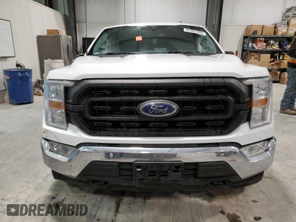 2022 Ford F-150 XL with VIN 1FTFX1E55NKD39753, listed as a Copart auction lot 87063394 with 50,191 mi miles and Salvage title. Bid and sale history available at DreamBid. Image 5.