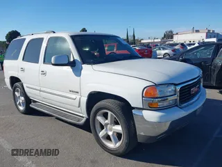 2004 GMC Yukon SLT with VIN 1GKEC13T64R289853, listed as a IAAI auction lot 41668408 with 163,829 mi miles. Bid and sale history available at carsss.com. Image 1.