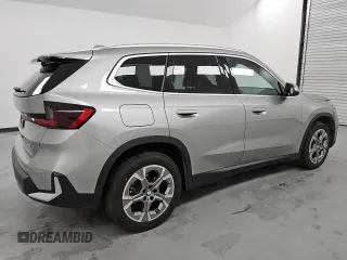 2023 BMW X1 xDrive28i with VIN WBX73EF00P5X84545, listed as a Copart auction lot 49742915 with 26,905 mi miles and Clean Title. Bid and sale history available at DreamBid. Image 3.