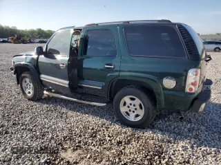 2004 Chevrolet Tahoe LS z VIN 1GNEC13Z24R174609, wystawiony jako Copart lot #52234105 z przebiegiem 182 306 mil mil oraz Szkoda całkowita • Salvage title. Historia ofert i sprzedaży dostępna na DreamBid. Obrazek 2.