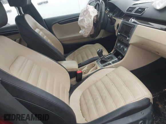 2013 Volkswagen CC VR6 Executive 4Motion with VIN WVWGU7AN9DE561506, listed as a IAAI auction lot 41459074 with 70,128 mi miles. Bid and sale history available at carsss.com. Image 5.