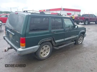 2000 Jeep Cherokee with VIN 1J4FT48S4YL240347, listed as a IAAI auction lot 42361311 with Not provided miles and . Bid and sale history available at DreamBid. Image 4.