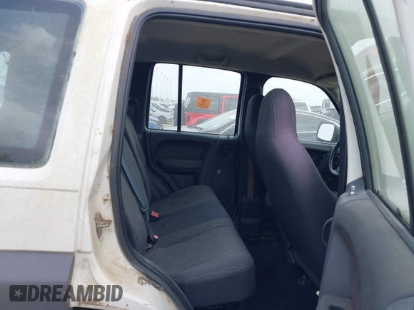 2003 Jeep Liberty Sport with VIN 1J4GK48KX3W536830, listed as a IAAI auction lot 41954874 with 128,757 mi miles and . Bid and sale history available at DreamBid. Image 8.