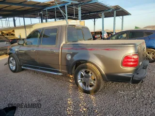 2002 Ford F-150 Harley Davidson with VIN 1FTRW07332KE04049, listed as a Copart auction lot 84742654 with 287,346 mi miles and Salvage Title. Bid and sale history available at carsss.com. Image 2.