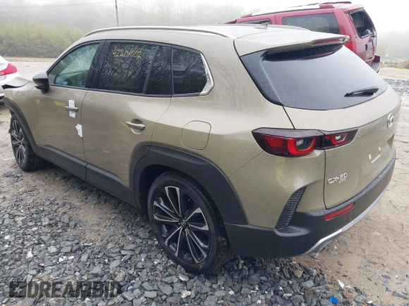2025 Mazda CX-50 Premium z VIN 7MMVABDY2SN339010, wystawiony jako IAAI lot #42201002 z przebiegiem 36 mil mil oraz . Historia ofert i sprzedaży dostępna na DreamBid. Obrazek 3.