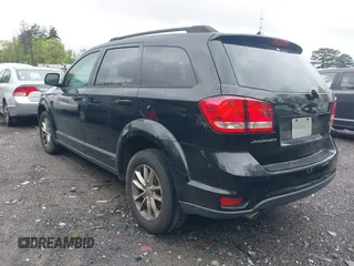 2016 Dodge Journey SXT with VIN 3C4PDCBG2GT100550, listed as a IAAI auction lot 41982670 with 184,601 mi miles. Bid and sale history available at carsss.com. Image 3.