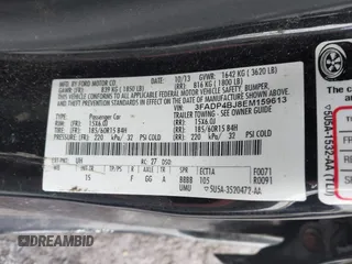 2014 Ford Fiesta SE with VIN 3FADP4BJ8EM159613, listed as a IAAI auction lot 41661005 with 100,006 mi miles. Bid and sale history available at carsss.com. Image 9.