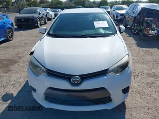 2015 Toyota Corolla L with VIN 2T1BURHE1FC252615, listed as a IAAI auction lot 41884936 with 113,805 mi miles and . Bid and sale history available at DreamBid. Image 12.