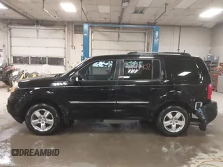 2012 Honda Pilot Touring with VIN 5FNYF4H91CB067014, listed as a IAAI auction lot 41749402 with 151,248 mi miles. Bid and sale history available at carsss.com. Image 14.