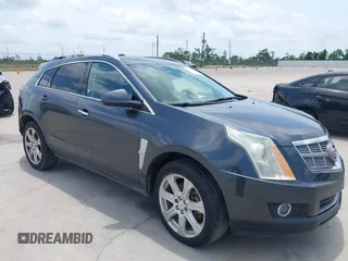2010 Cadillac SRX Performance Collection z VIN 3GYFNBEY9AS587888, wystawiony jako IAAI lot #42298655 z przebiegiem 127 397 mil mil oraz . Historia ofert i sprzedaży dostępna na DreamBid. Obrazek 1.