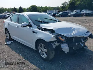 2015 Kia Optima LX z VIN KNAGM4A76F5569420, wystawiony jako IAAI lot #42423133 z przebiegiem 93 094 mil mil oraz . Historia ofert i sprzedaży dostępna na DreamBid. Obrazek 1.