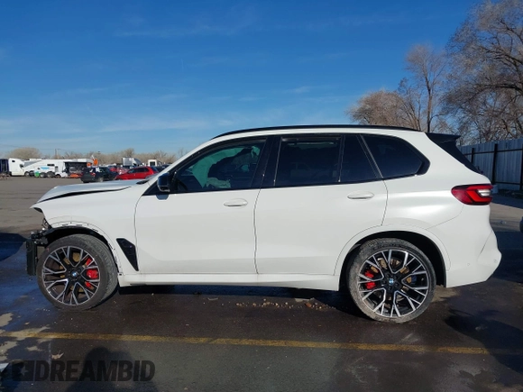 2022 BMW X5 M with VIN 5YMJU0C02N9K39077, listed as a IAAI auction lot 41711996 with 11,875 mi miles. Bid and sale history available at carsss.com. Image 15.