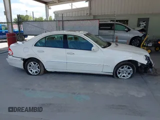 2003 Mercedes-Benz E 320 with VIN WDBUF65J43A241903, listed as a IAAI auction lot 42157490 with 122,773 mi miles and . Bid and sale history available at DreamBid. Image 13.
