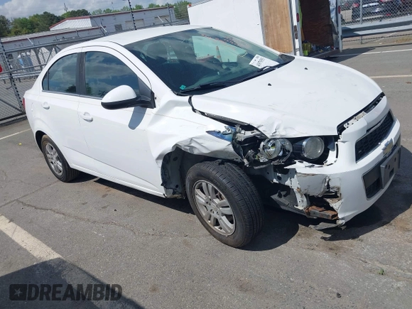 2014 Chevrolet Sonic LT with VIN 1G1JC5SH0E4232070, listed as a IAAI auction lot 41970353 with 140,557 mi miles and . Bid and sale history available at DreamBid. Image 1.