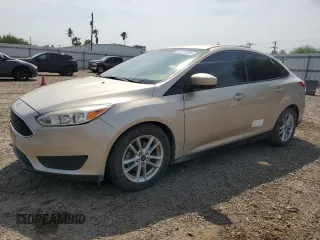 2018 Ford Focus SE z VIN 1FADP3F24JL321911, wystawiony jako Copart lot #51744985 z przebiegiem 60 226 mil mil oraz Szkoda całkowita • Salvage title. Historia ofert i sprzedaży dostępna na DreamBid. Obrazek 1.