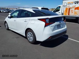 2021 Toyota Prius L Eco with VIN JTDKAMFU9M3133528, listed as a IAAI auction lot 41950856 with 138,787 mi miles. Bid and sale history available at carsss.com. Image 3.