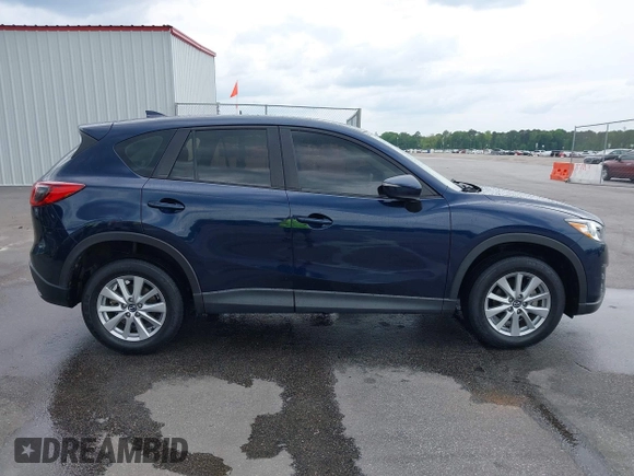 2016 Mazda CX-5 Sport with VIN JM3KE2BY0G0850298, listed as a IAAI auction lot 42107007 with 97,478 mi miles. Bid and sale history available at carsss.com. Image 13.