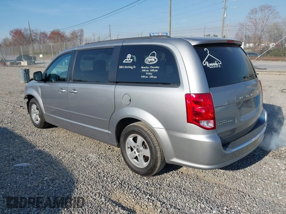2013 Dodge Grand Caravan SXT with VIN 2C4RDGCG3DR553217, listed as a IAAI auction lot 41898964 with 101,989 mi miles and . Bid and sale history available at DreamBid. Image 3.