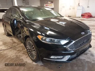 2017 Ford Fusion Titanium z VIN 3FA6P0SU8HR215570, wystawiony jako IAAI lot #41427407 z przebiegiem 97 281 mil mil oraz . Historia ofert i sprzedaży dostępna na DreamBid. Obrazek 1.