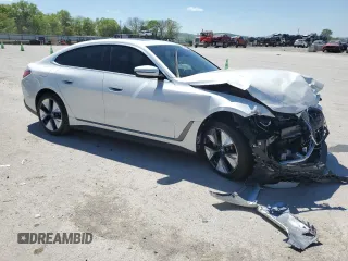2023 BMW i4 eDrive35 with VIN WBY43AW02PFP53587, listed as a Copart auction lot 51493324 with 15,595 mi miles. Bid and sale history available at carsss.com. Image 4.