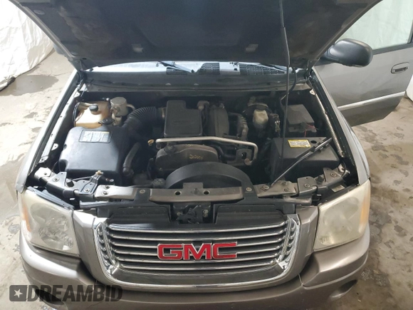 2007 GMC Envoy SLT with VIN 1GKDT13S072260591, listed as a Copart auction lot 70370504 with 200,441 mi miles and Salvage Title. Bid and sale history available at carsss.com. Image 13.