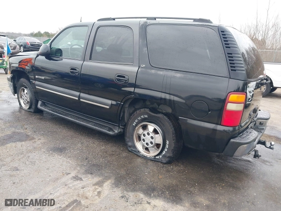 2003 Chevrolet Tahoe LS with VIN 1GNEC13Z73R243308, listed as a IAAI auction lot 41510266 with 246,378 mi miles. Bid and sale history available at carsss.com. Image 3.
