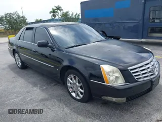 2010 Cadillac DTS w/1SC with VIN 1G6KD5EY8AU106072, listed as a IAAI auction lot 41999952 with 165,866 mi miles. Bid and sale history available at carsss.com. Image 1.