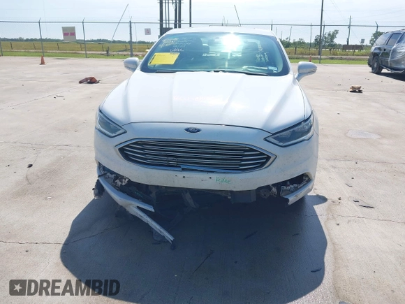 2018 Ford Fusion Titanium with VIN 3FA6P0RU3JR124007, listed as a IAAI auction lot 42207863 with 179,708 mi miles and . Bid and sale history available at DreamBid. Image 6.