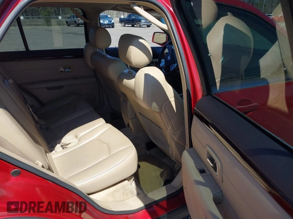 2008 Cadillac SRX AWD with VIN 1GYEE637780138692, listed as a IAAI auction lot 41660350 with 173,934 mi miles. Bid and sale history available at carsss.com. Image 8.
