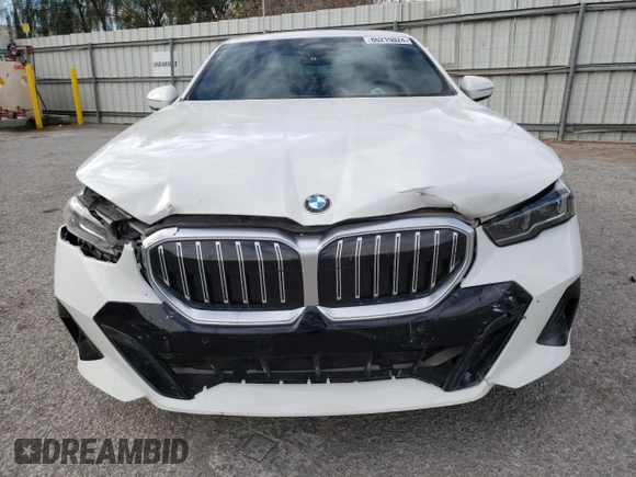 2024 BMW 5 Series 530i with VIN WBA43FJ02RCR63663, listed as a Copart auction lot 86215024 with 3,328 mi miles and Salvage Title. Bid and sale history available at carsss.com. Image 5.