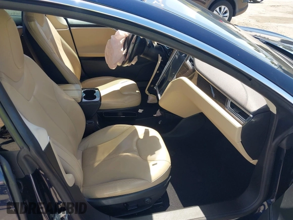 2014 Tesla Model S 60 with VIN 5YJSA1H12EFP46760, listed as a IAAI auction lot 42344596 with 106,252 mi miles and . Bid and sale history available at DreamBid. Image 5.