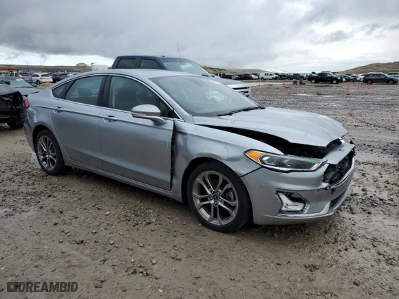 2020 Ford Fusion Hybrid Titanium with VIN 3FA6P0RU5LR100360, listed as a Copart auction lot 51325575 with 77,217 mi miles and Salvage Title. Bid and sale history available at carsss.com. Image 4.