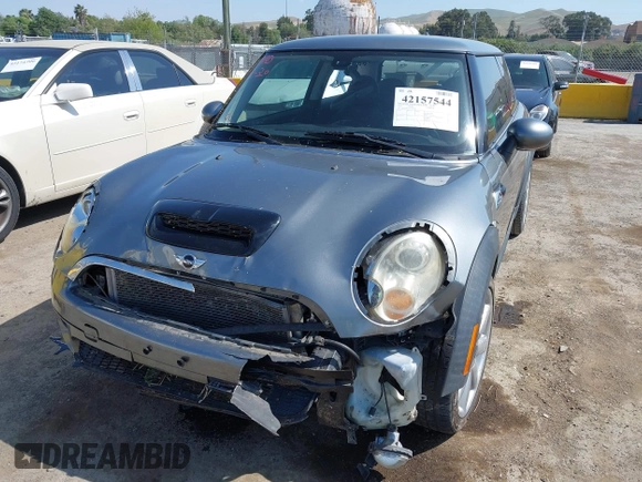 2007 MINI Hardtop S with VIN WMWMF73597TL86892, listed as a IAAI auction lot 42157544 with 93,097 mi miles and . Bid and sale history available at DreamBid. Image 6.