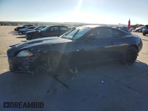2008 Jaguar XK with VIN SAJWA43C589B23096, listed as a Copart auction lot 79337334 with 143,902 mi miles and Salvage Title. Bid and sale history available at carsss.com. Image 1.