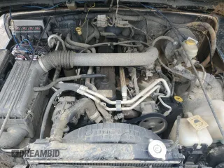 2005 Jeep Wrangler Rubicon with VIN 1J4FA69S95P377014, listed as a Copart auction lot 42676915 with 130,571 mi miles and Salvage Title. Bid and sale history available at carsss.com. Image 12.