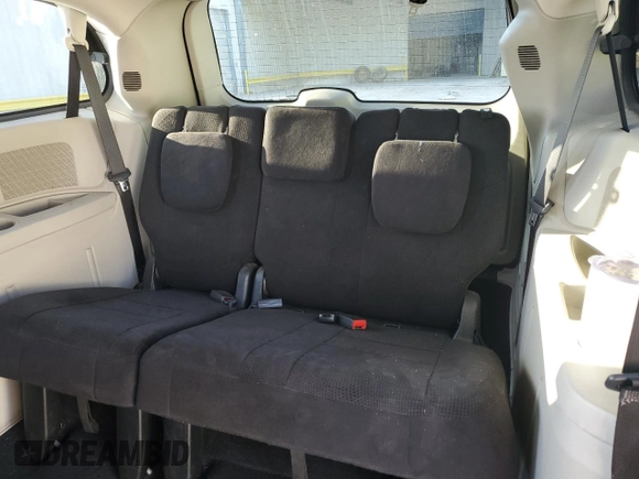 2014 Dodge Grand Caravan SXT with VIN 2C4RDGCG1ER121033, listed as a Copart auction lot 52030715 with 105,451 mi miles and Salvage Title. Bid and sale history available at DreamBid. Image 10.