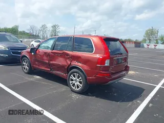 2013 Volvo XC90 Premier Plus z VIN YV4952CYXD1635200, wystawiony jako IAAI lot #41962622 z przebiegiem Nie podano mil oraz . Historia ofert i sprzedaży dostępna na DreamBid. Obrazek 3.