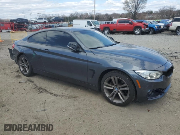 2015 BMW 4 Series 428i xDrive with VIN WBA3N9C55FK247227, listed as a Copart auction lot 50564735 with 121,882 mi miles and Salvage title. Bid and sale history available at DreamBid. Image 4.