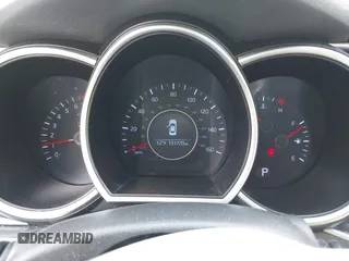 2015 Kia Optima LX z VIN KNAGM4A74F5590332, wystawiony jako IAAI lot #42304364 z przebiegiem 131 720 mil mil oraz . Historia ofert i sprzedaży dostępna na DreamBid. Obrazek 7.