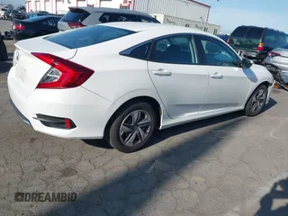 2019 Honda Civic Sedan LX with VIN 2HGFC2F62KH505921, listed as a IAAI auction lot 41982303 with 72,618 mi miles. Bid and sale history available at carsss.com. Image 4.