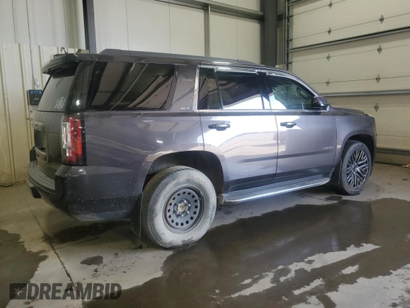2015 GMC Yukon SLT with VIN 1GKS2BKC7FR279302, listed as a Copart auction lot 47827085 with 176,076 mi miles and Salvage Title. Bid and sale history available at carsss.com. Image 3.