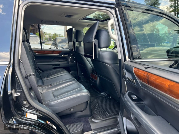2018 Lexus LX 570 with VIN JTJHY7AX8J4258452, listed as a Copart auction lot 57357365 with 131,556 mi miles and Clean title. Bid and sale history available at DreamBid. Image 6.
