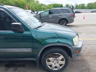 2001 Honda CR-V LX z VIN JHLRD18401C000348, wystawiony jako IAAI lot #42377422 z przebiegiem 238 192 mil mil oraz . Historia ofert i sprzedaży dostępna na DreamBid. Obrazek 12.