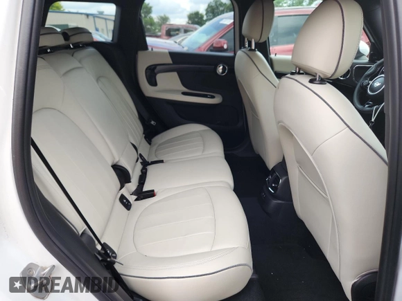 2019 MINI Countryman Cooper S с VIN WMZYT5C59K3G94318, выставлен на аукционе Copart как лот 64745385 с пробегом 38 342 миль миль и Списание • Salvage title. История ставок и продаж доступна на DreamBid. Изображение 11.