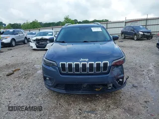 2021 Jeep Cherokee Latitude Lux with VIN 1C4PJLMN8MD155199, listed as a IAAI auction lot 42335462 with 41,069 mi miles and . Bid and sale history available at DreamBid. Image 12.